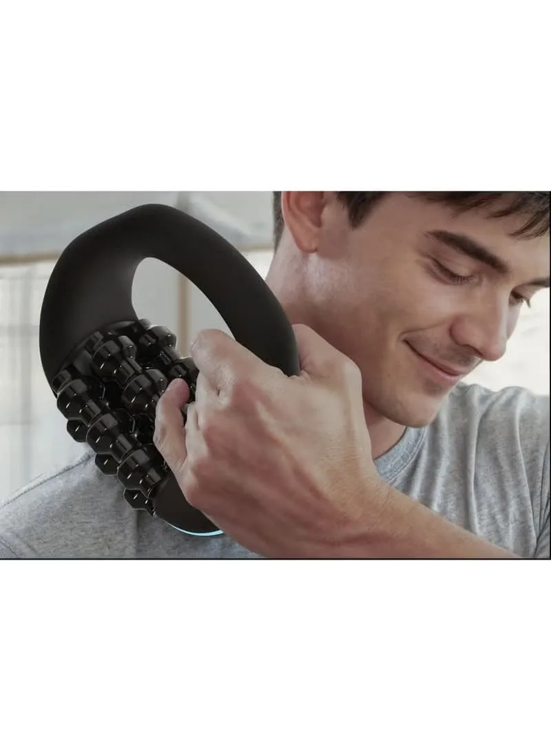 A man using the black ergonomic powered rolling massager on his shoulder