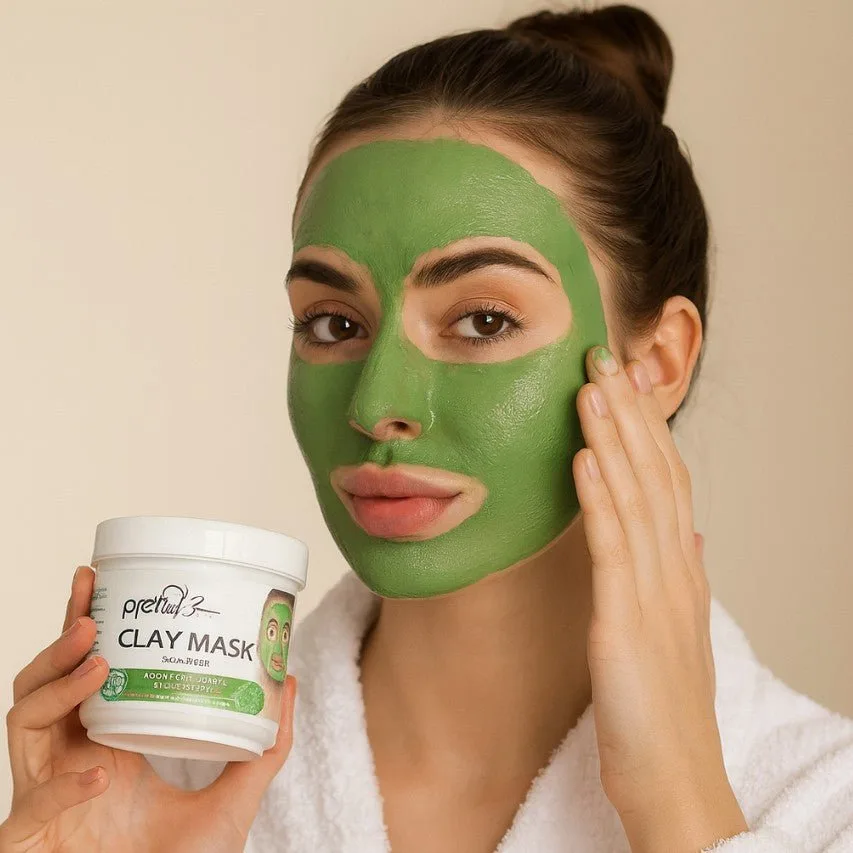Woman applying Pretty Be Green Clay Mask to her face
