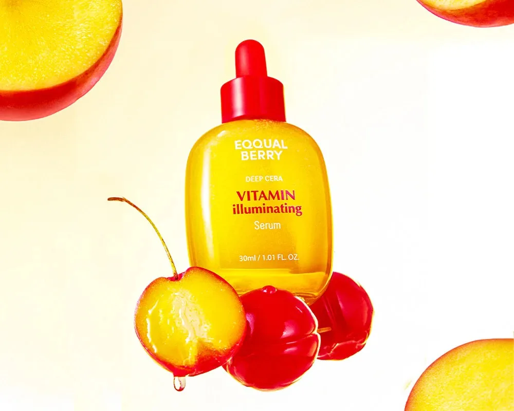 Eqqualberry Deep Cera Vitamin Illuminating Serum bottle with fruit slices