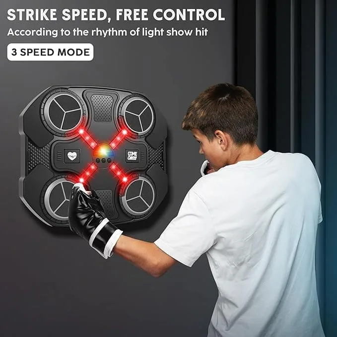 A young boy practicing his punches on a wall-mounted music boxing machine featuring three speed modes.